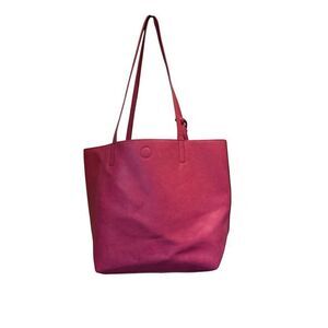 Women's Pink Purse with Tassel Accent and floral inside‎ magnetic closure